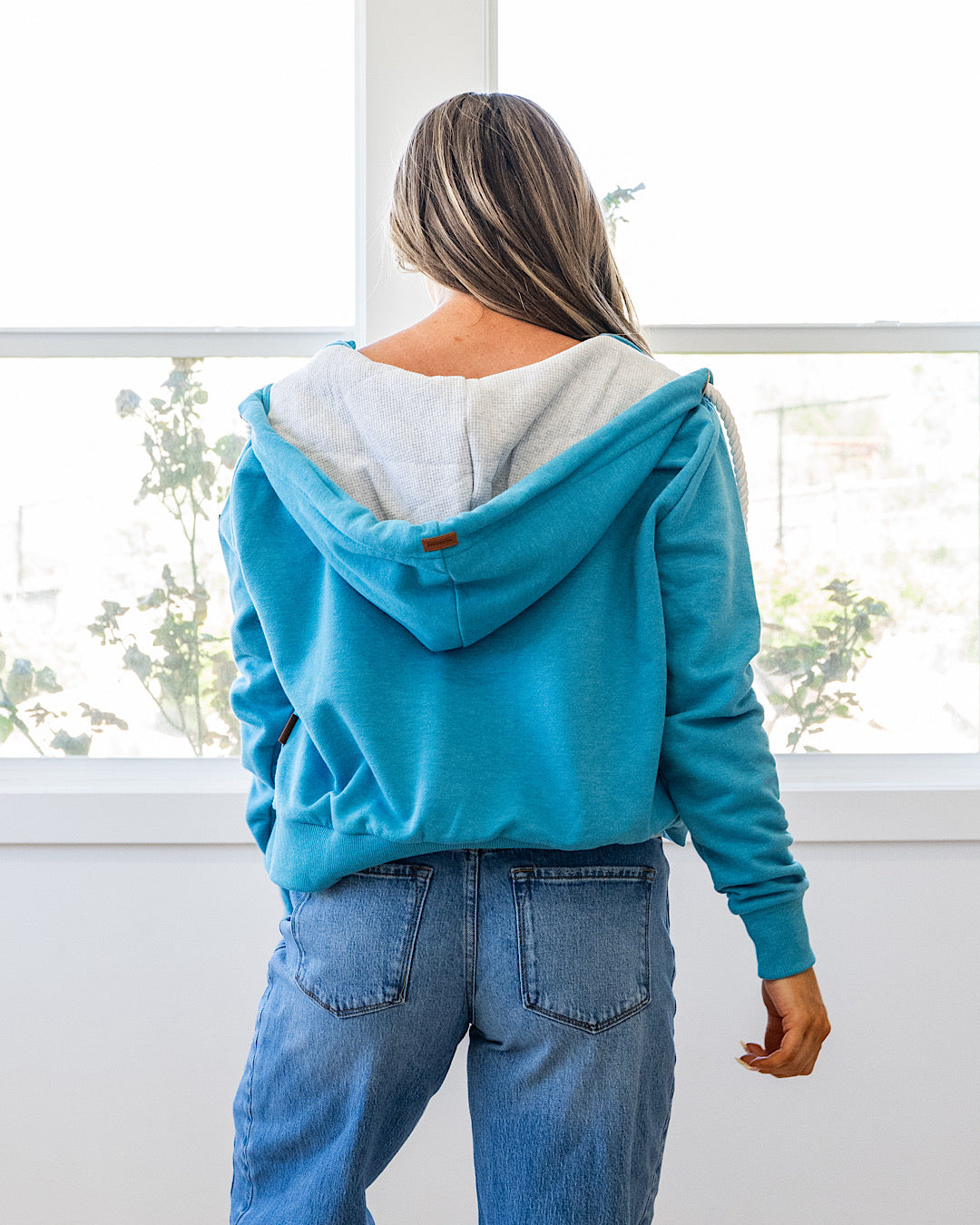 Sudadera corta con cremallera Wanakome - Azul laguna VENTA FINAL