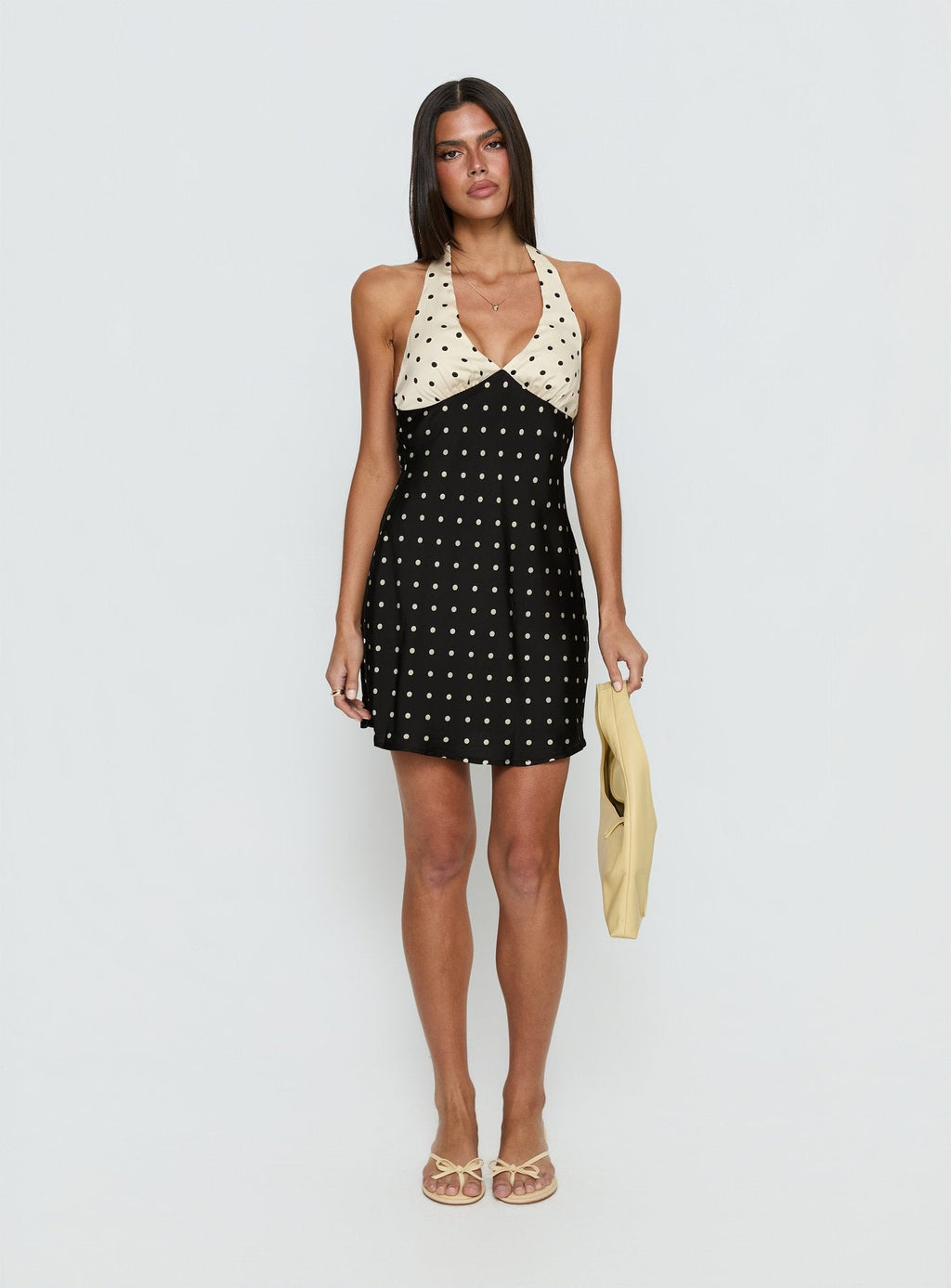 Minivestido Rihana con cuello halter y estampado de lunares