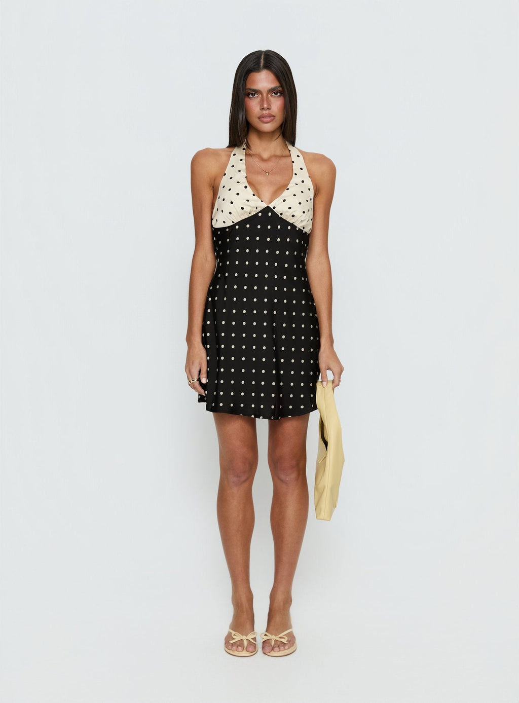 Minivestido Rihana con cuello halter y estampado de lunares